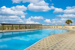 Jetty East | Sleeps 4 | Paradise Palms | Pool | Private Beach